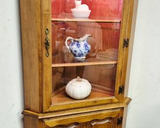 Maple lighted corner cabinet 