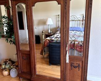 Armoire matches wall mirror and Chest, bedside tables
