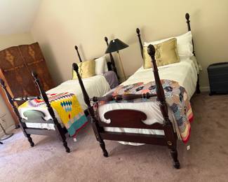 Two antique mahogany twin beds