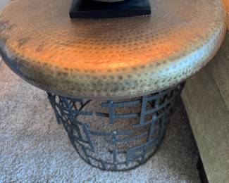Hammered copper and iron side table                             25.5"h x 23" diameter