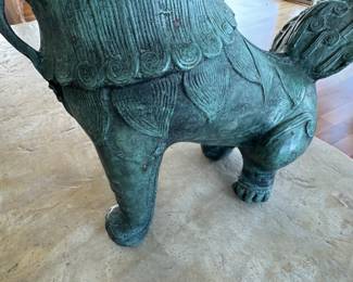Patinated bronze foo lion             14"h x 14" long x 7"d 