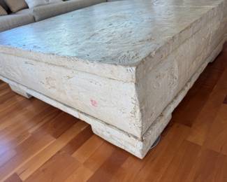 Post modern plaster coffee table with faux crack                    16"h x 49" square