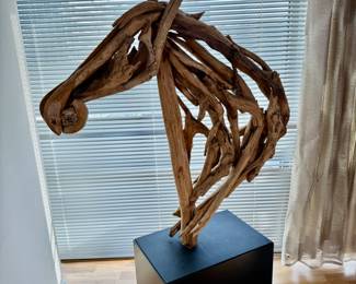 Driftwood sculpture of a horse     60"h x 35"w