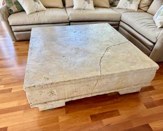 Post modern plaster coffee table with faux crack                    16"h x 49" square