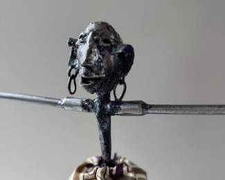 African metal jewelry holder