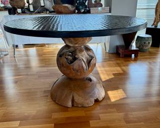 Hammered bronze dining table with chunky burlwood pedestal  30"h x 50" diameter