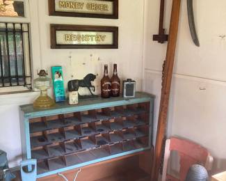 Postal sorting cabinet and reverse painted signage from the Post Office
