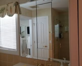 Mirrored medicine cabinet; vanity lights