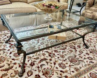 Gorgeous Large Brass Coffee Table & Bevel Glass Top with Bevel Glass Lower Shelf and Carved Feet, Table has Matching Side Table Also Available. 54"W x 33"D x 20.25"H,