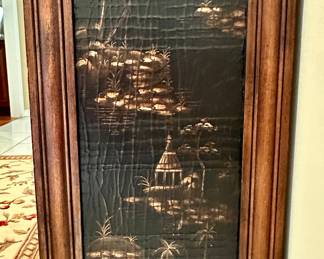 The Sides of this Cabinet have Asian-Inspired Scenes