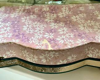The Vanity Set is Laid Out in a Frabric Hard Cover Box with Hinge Closure and Carved Silver Rim.
