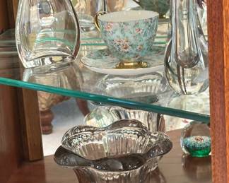 The Top Shelf Holds Two Baccarat Vases and a Vintage Shelley Cup and Saucer, “Marguerite”