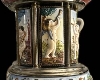 Vintage Reuge Italian Cherub Musical Cigarette or Lipstick Carousel, 15", Handmade in Capodimonte Porcelain and Finished with Gold-Plating Over Brass. As the doors open to the lovely "Lara's Theme" from Dr Zhivago, the old style Reuge Lyre is revealed inside
