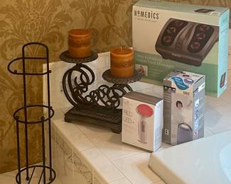 Detailed View of a Few Items Available in the Primary Bath Including Red LED+ Anti Aging Therapy, Homedics Shiatsu Foot Bath and More!