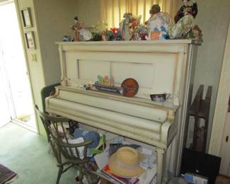 working player piano, antique chair, hats