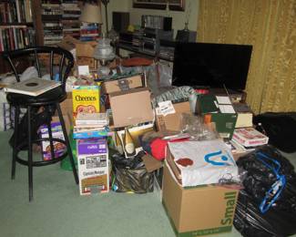 boxes, bins, television, candle sticks