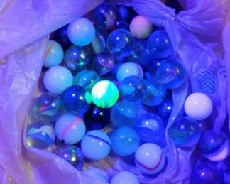 marbles glowing under black light