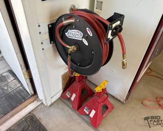 2558 50Ft Hose Reel and 2 Snap on Jack Stands