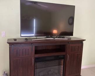 Television is NOT available. Stand alone fireplace is available.