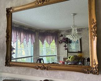 Ornate gold wooden framed mirror. $150.