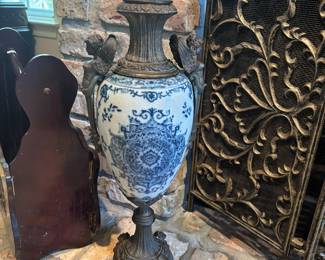 Nice vase with metal trim.  Nudes on each side.