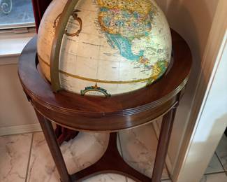 World globe in wooden stand. $150