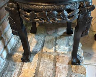 Small ornately carved round tables, 2 $8 each, marble tops.