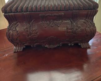Ornate wooden box.