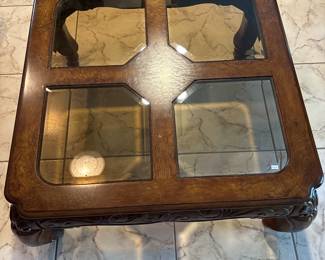Coffee table, glass top, ornate trim.  42” square, 20 T. $175.