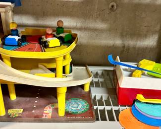 Vintage little people parking garage with elevator $60
Vintage Fisher-Price record player with records all pieces $25