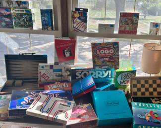 Board games - Life, logo, super scrabble, gestures, last word, sorry, monopoly, hoopla, scatagories, chess/checkers, backgammon, puzzles