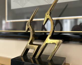 Dolbi Cashier art deco marble and brass figurine