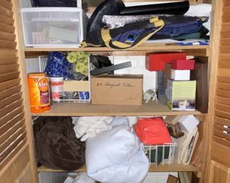Contents of Closet-Blankets, Pillows, Artificial Flowers, Folding Teak Stool with Canvas seat, and more.