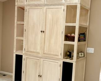 Gorgeous custom built cabinet that holds a tv and speaker or could be used for storage. 