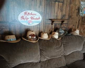 Brown Couch & Cowboy Hats