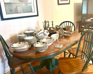green dining table with 4 chairs