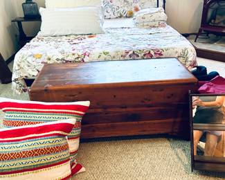 Cedar chest, decorative pillows