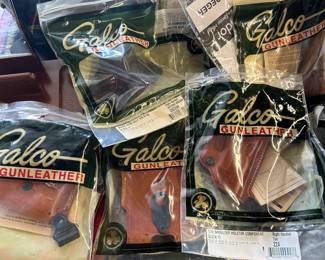 Galco belt holsters and shoulder harness