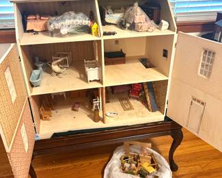 doll house with bag of furniture