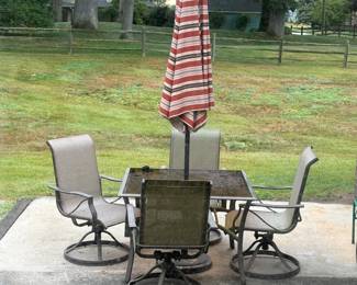 . . . nice patio set with umbrella