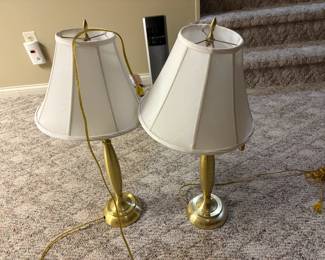 . . . a pair of brass lamps