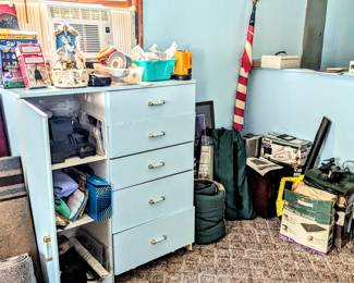Dresser full of garage supplies, camping equipment, shop items