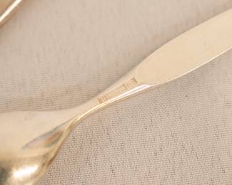Closeup of the set of Christofle France silver plated dinner forks and salad forks