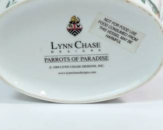 Base of the Lynn Chase 'Parrots of Paradise' porcelain ginger jar with lid, the body depicting parrots and a cockatoo, the lid with a rosebud finial.