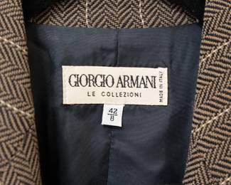 Closeup of Giorgio Armani Le Collezioni women's brown herringbone and pinstripe blazer and skirt set, size 42/8, made in Italy