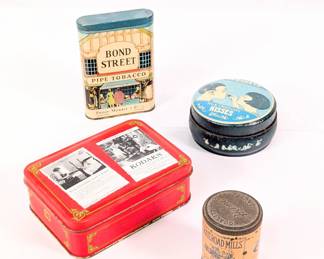 A Vintage Bond Street Pipe Tobacco tin, a vintage 1994 Kodak Film Memories Collection Christmas Holiday commemorative tin, a vintage Hershey's Milk Chocolate Kisses box, and a Railroad Mills Sweet Scotch Snuff tin
