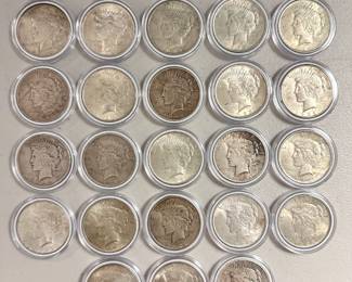 Twenty-nine (29) United States Peace Silver Dollars of various dates