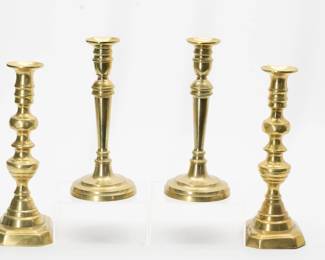 Two pairs of vintage brass candlestick holders