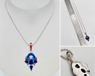 Striking sterling silver pendant inlaid with brightly colored semi precious stones on a sterling silver chain.