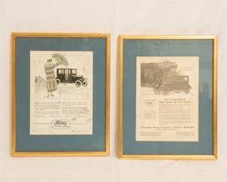 Framed vintage Ford and Chevrolet advertising